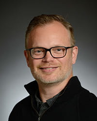 A photo of Christopher N. Mayhew, PhD.