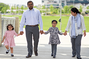 An image of a family walking outside.