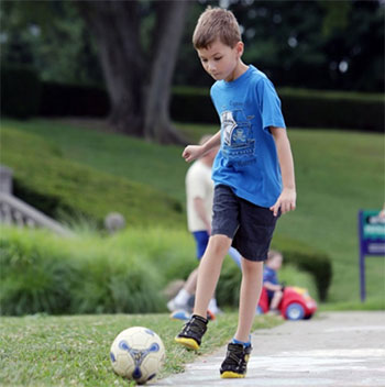 Sam playing soccer