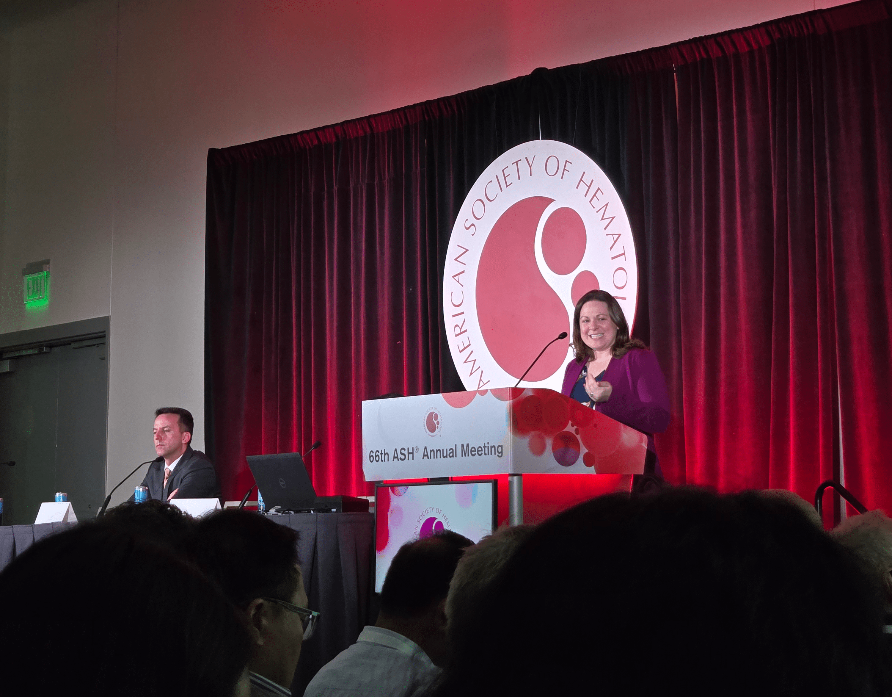 Courtney speaking at ASH 2024.