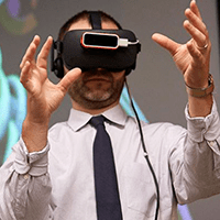 A team member demonstrates our virtual surgical planning technology that allows surgeons to walk through a 3D “digital twin” of their patients’ hearts before the surgery.