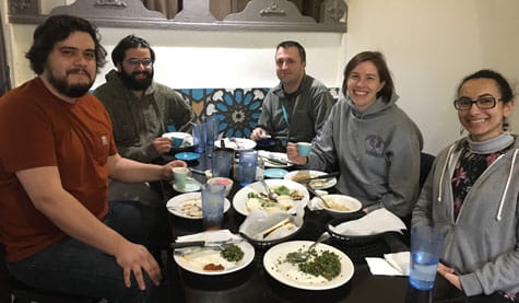 Emily Miraldi and team enjoy a lunch together.