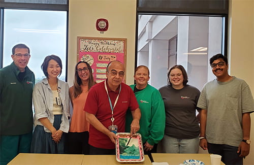 The lab celebrating Soner's birthday.