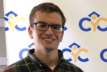 Scott Emmert receiving the UC Presidential Leadership Medal of Excellence.