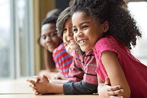 A group of smiling children.
