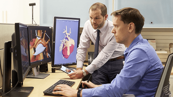 Ryan Moore, MD and Jeff Cimprich working in the Media Lab Facility.