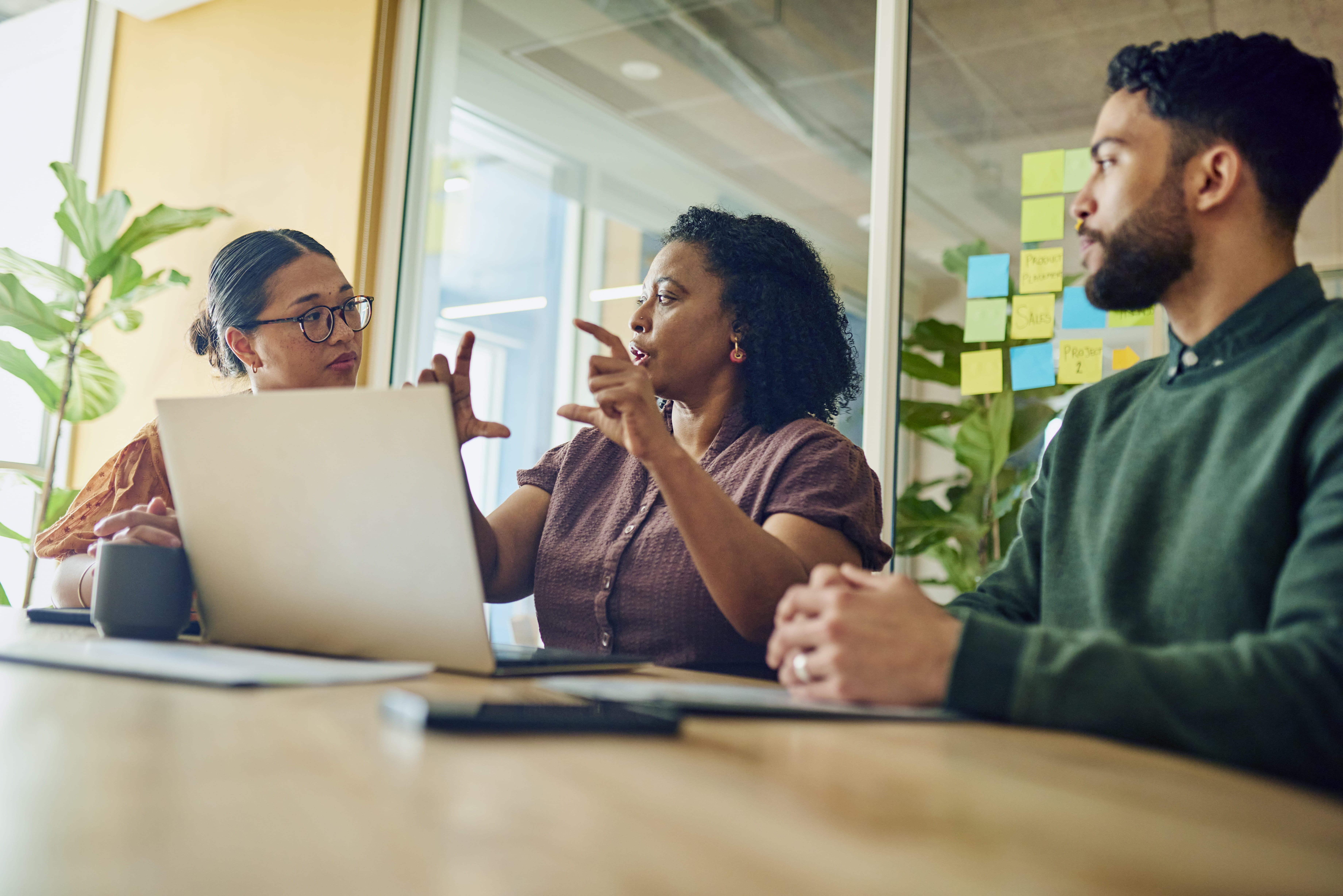 Employees meet and discuss innovative ideas.