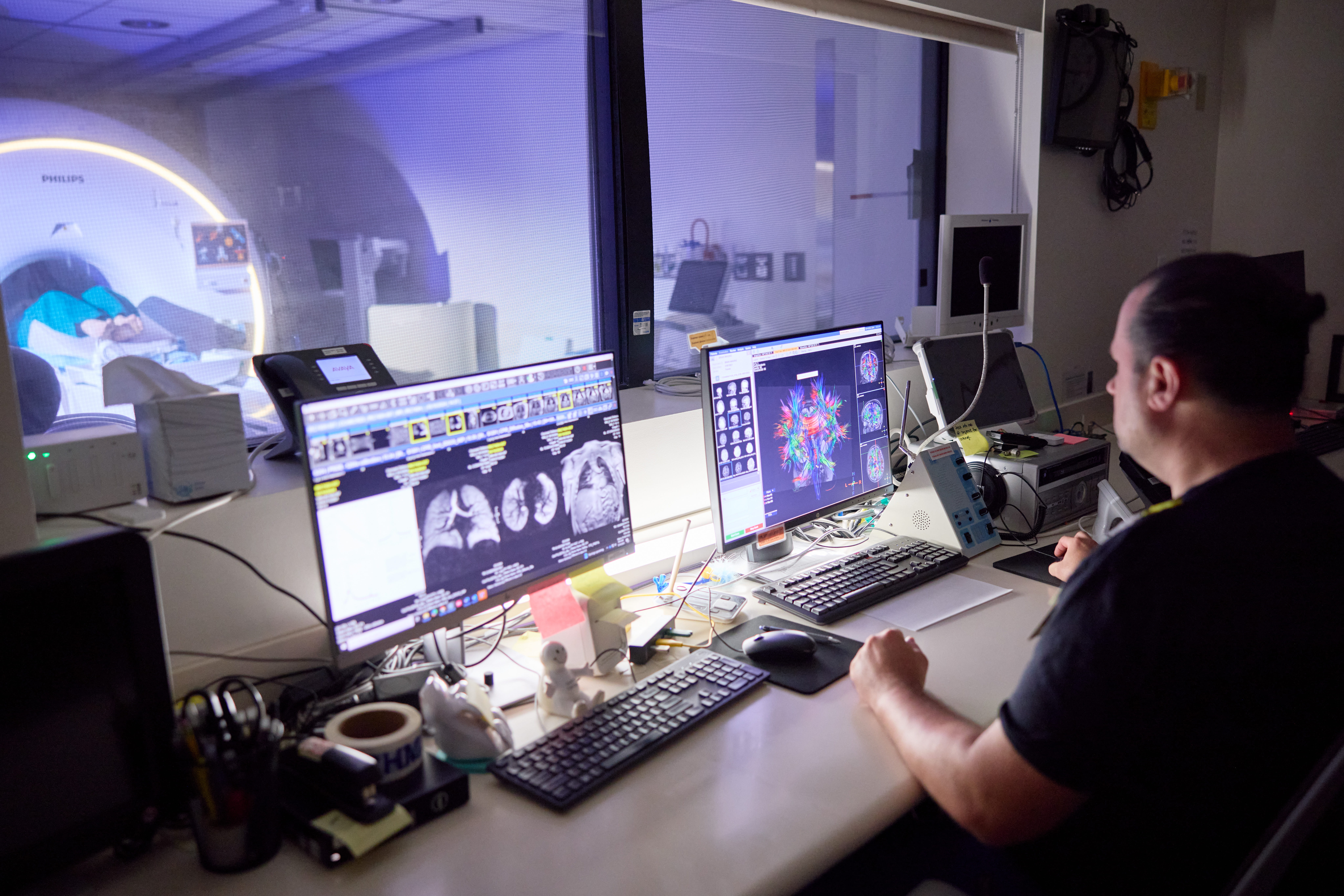 Scientist reviews MRI imaging.