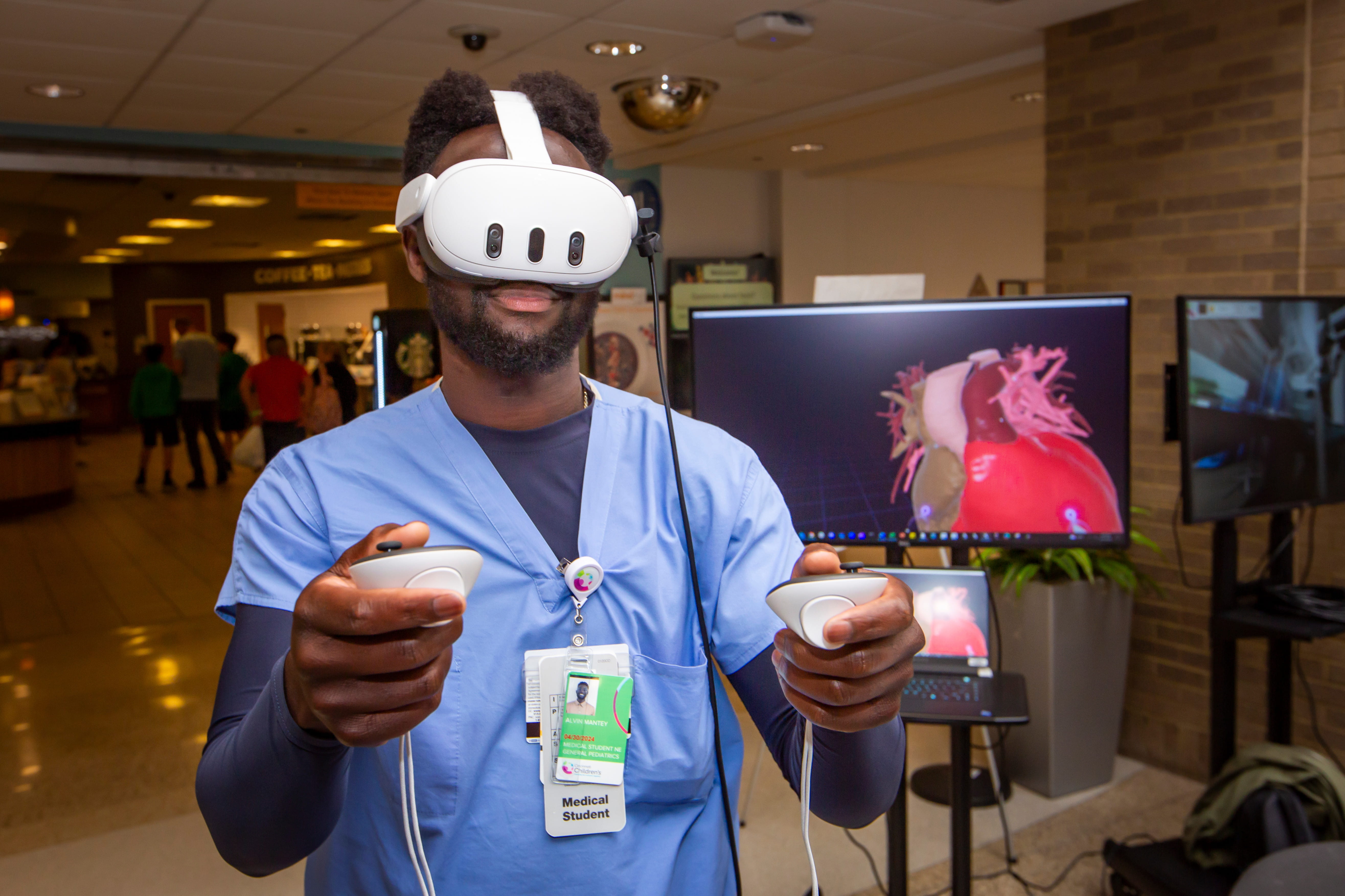 Photo depicts a physician practicing heart surgery using virtual reality.