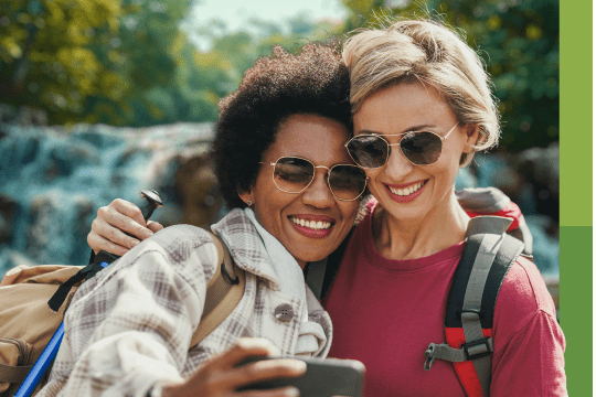An ACHD patient and her friend taking a selfie.
