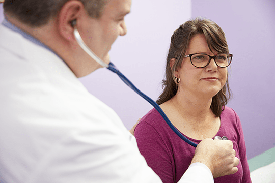 A picture of an ACHD patient getting a check-up.