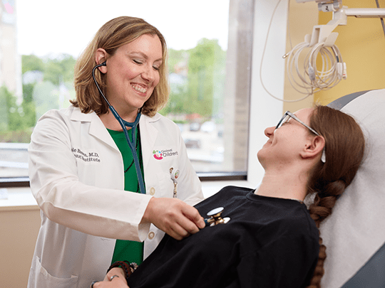 Dr. Brown examines Katie.