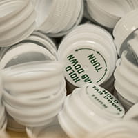 This ia a photo of medication bottle tops.