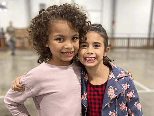 Brooklyn and Pia share a hug.