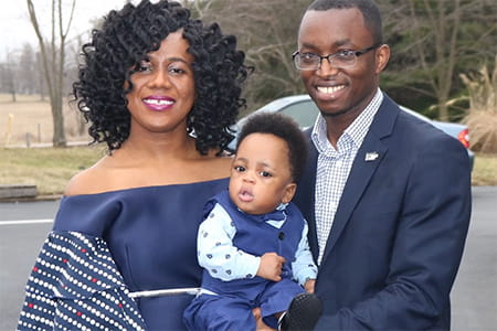 Eil with his parents.