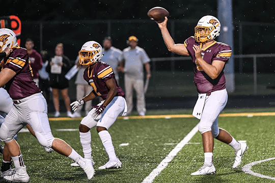 Drew throwing the football.