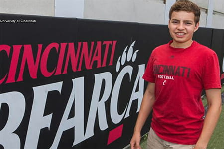 Mitch smiling at the University of Cincinnati.