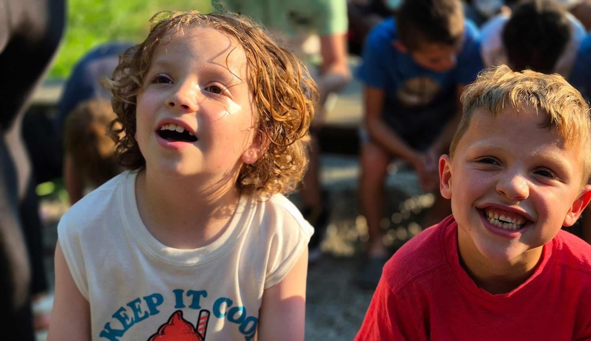 Two campers smiling.