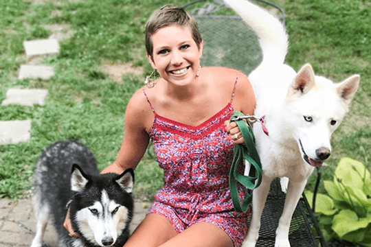 Madison with her dogs.