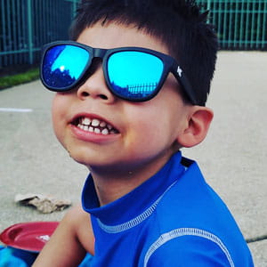 Hunter smiles in shades.