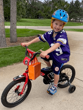 Vincent on his bicycle.