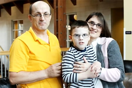 Beni with his dad and mom.