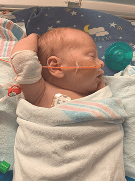 Campbell in the hospital as a baby.