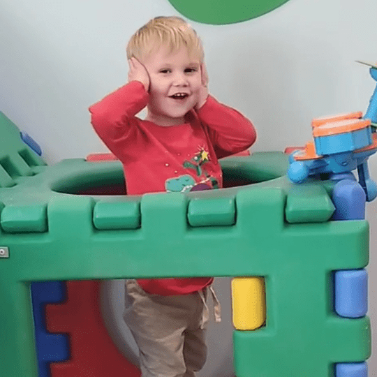 Levi covers his ears.