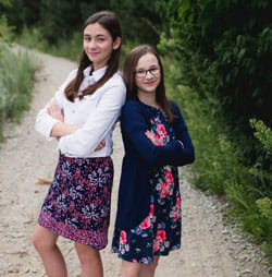 Aurit sisters smile.