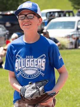 Aiden plays baseball.