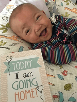 Baby Charlsie smiles.