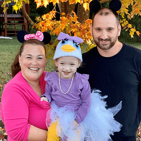 Jennifer and Michael Cox with their daughter, Charlsie.