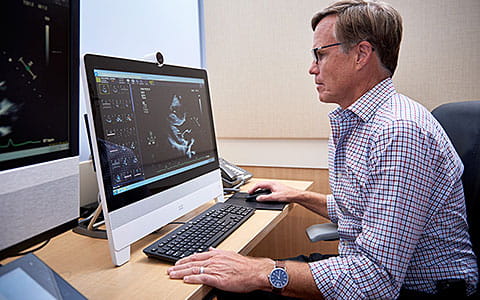 Dr. Thomas Kimball of Cincinnati Children's reads an echocardiogram.