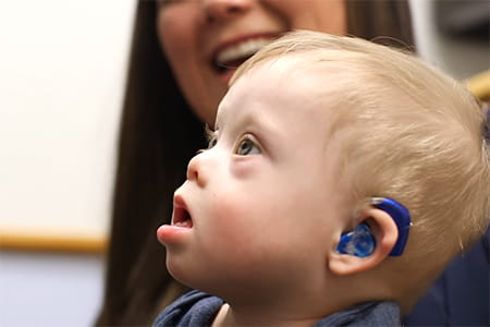 Axl, hearing aid patient throught Telehealth.