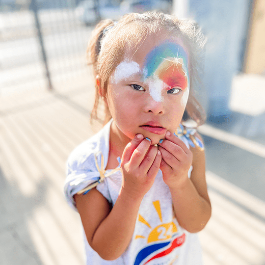 Emmabelle with face painted.
