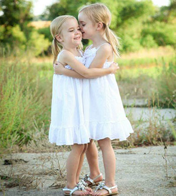 Twins hug.