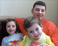 Will, with his dad and sister.