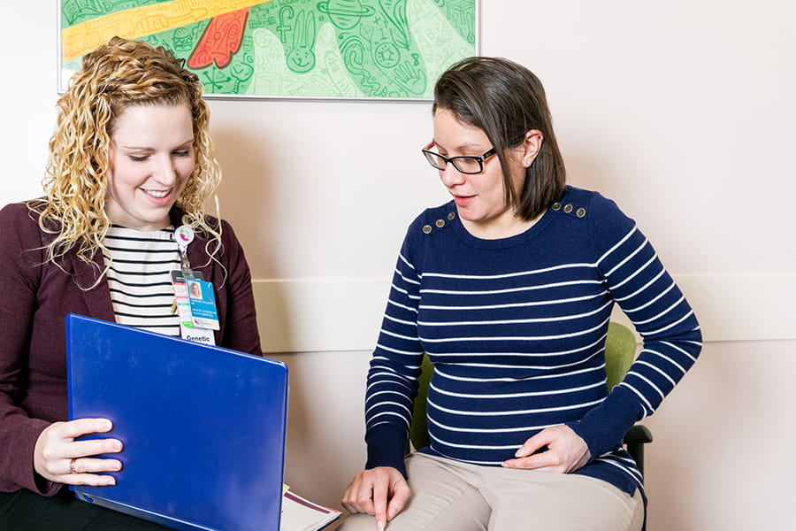 Patient with genetic counselor.