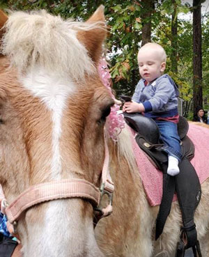 Johnny on horseback.
