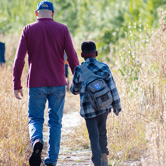 James and his dad walking.