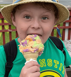 Xavier eats ice cream.