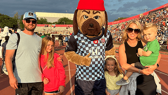 Sutton family at soccer game.