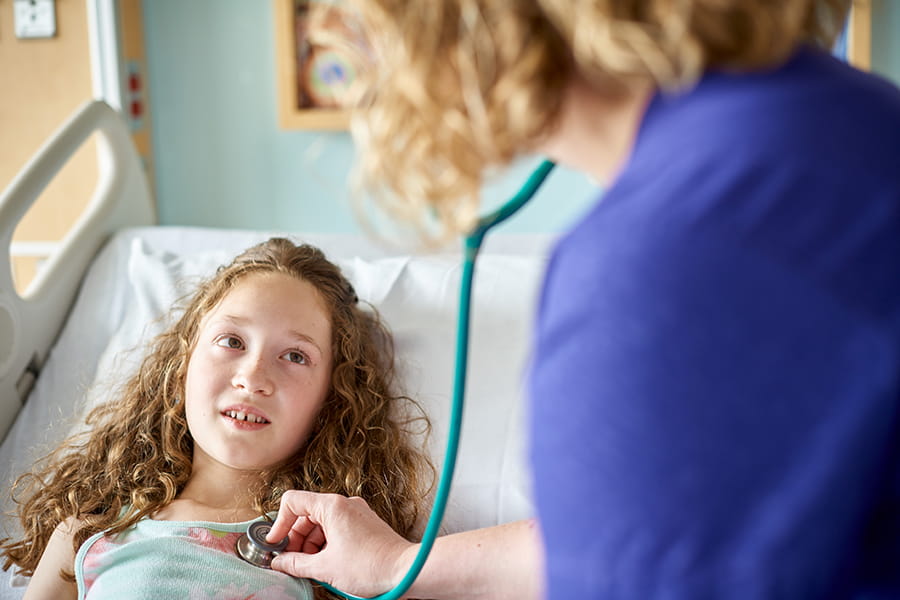 A young patient with a nurse.