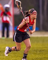 Katherine on lacrosse field.