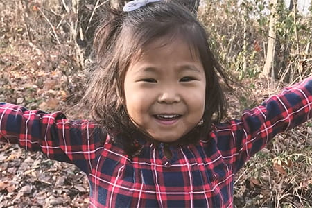 Olive, Liver Transplant patient, smiling.