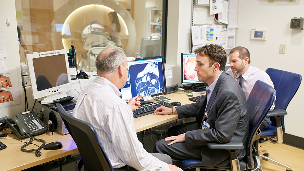 A photo of a group of researchers and doctors.