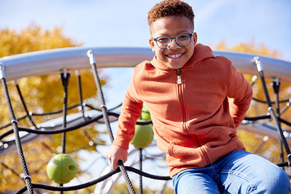A photo of a boy smiling.