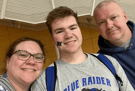 Ethan and his parents.