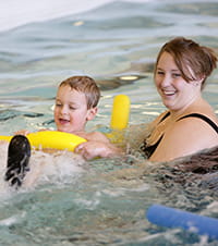Aquatic therapy is provided in a one-on-one setting.