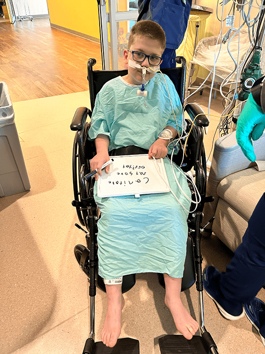 Philip uses his white board.